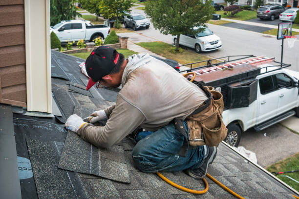 Professional Storm Damage Roof Repair technician working in Saxonburg, PA